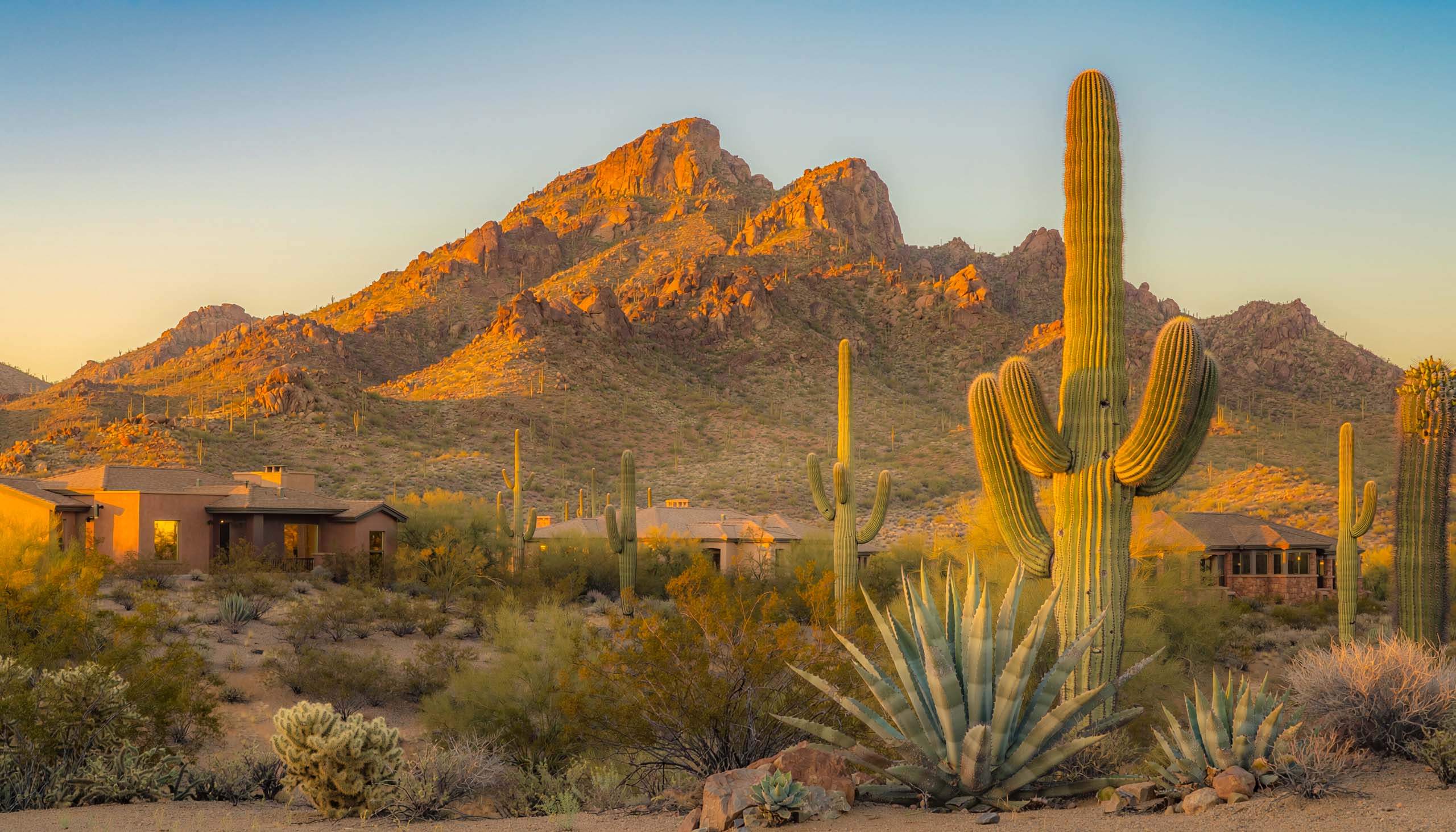A serene, landscape photograph taken from the perspective of a large, custom-lot pro